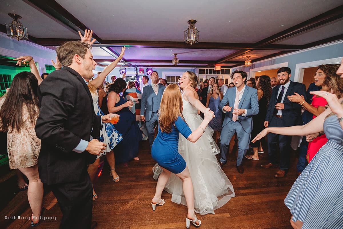 Wedding guests filling the dance floor at a Bueller performance